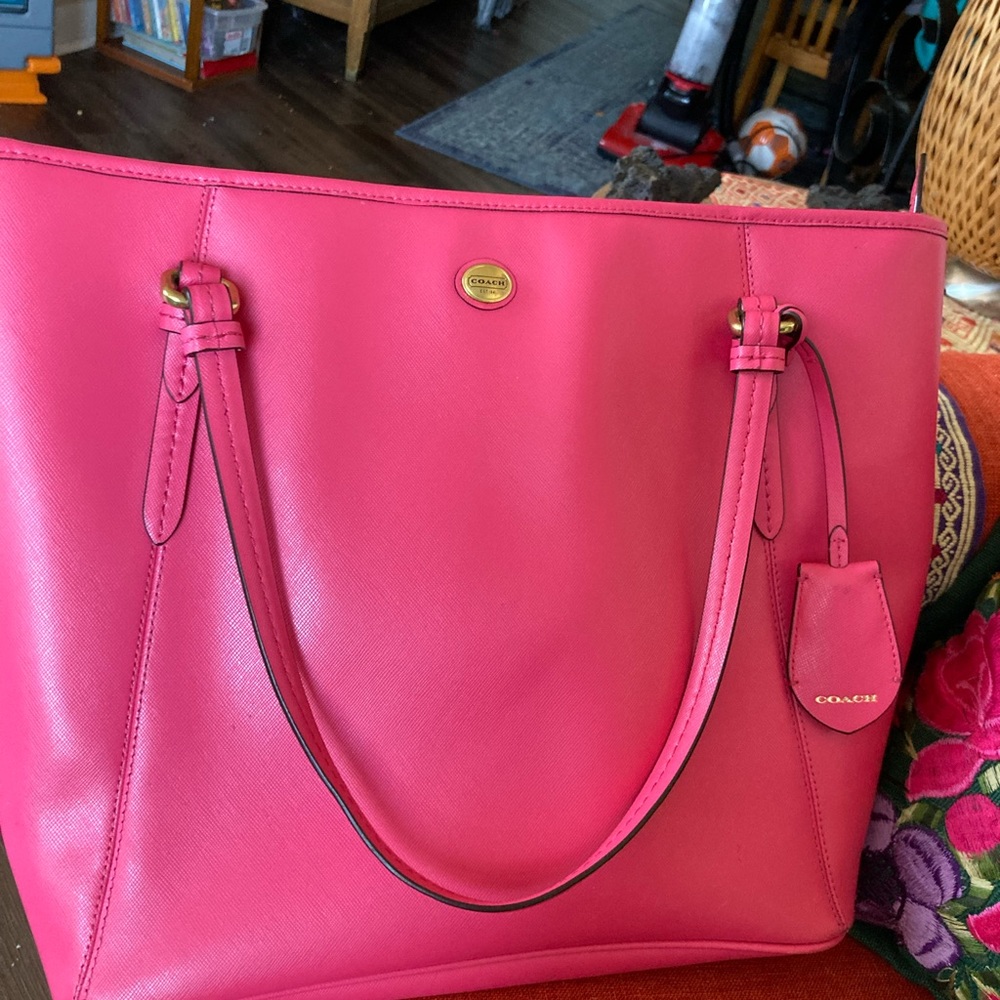 COACH pink tote.